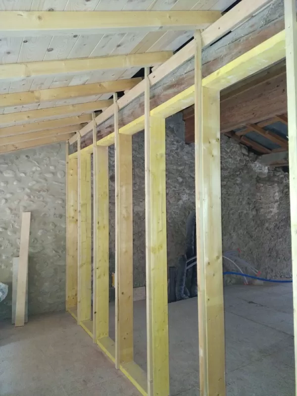 mur en ossature bois sur plancher bois en OSB avec isolation ouate de cellulose 