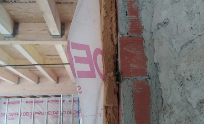 Gestion de l'humidité pour les murs enterrés: contre cloison en brique avec isolation